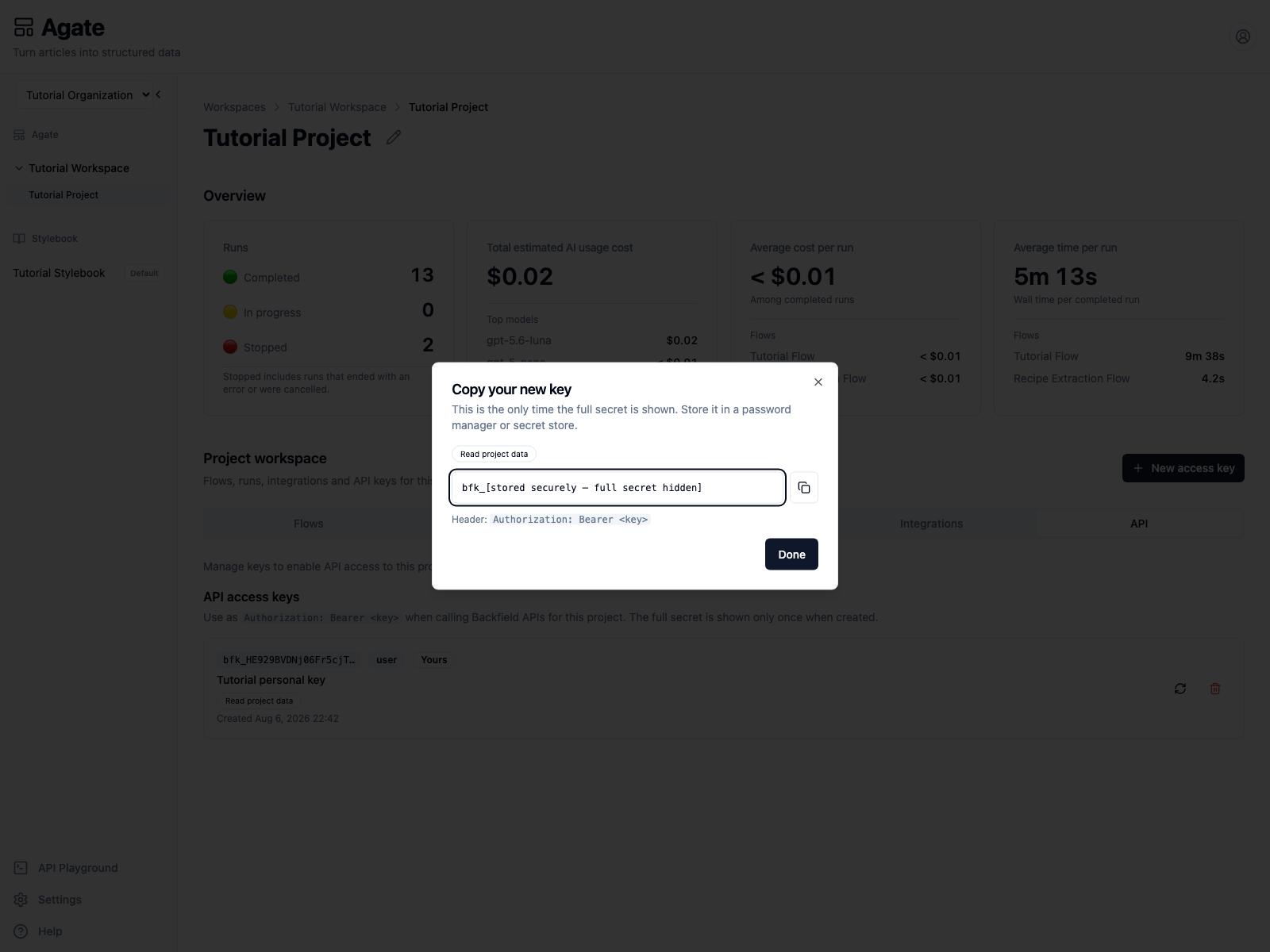 One-time API key dialog with the secret intentionally hidden